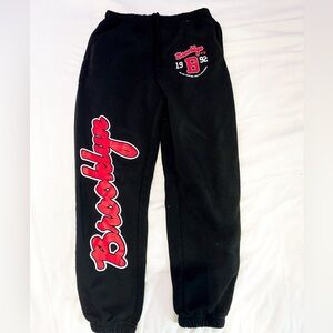 Black and red sweatpants